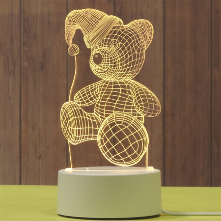 Lampa LED decorativa,  3D, Urs cu palarie, cu telecomanda, doua moduri de alimentare USB si baterii, 20 cm inaltime, din material acril si lumina multicolora, alb