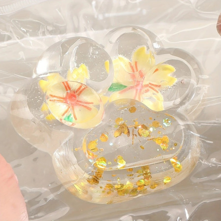Jucarie Antistres Squishy, Cyrax, Labuta de Pisica Pufoasa, cu Revenire Lenta, 7 x 6.5 cm, Model Flori 2, Transparent