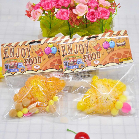 Jucarie Antistres Squishy, Cyrax, cu Revenire Lenta, Squeeze Pinch Family, Model Croissant, 10x8 cm, 90g, Ambalaj Transparent, Maro