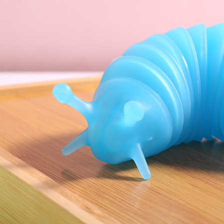 Jucarie Senzoriala Antistres, Cyrax, Fidget Toys, Omida Tip Breloc, 11 cm, +3 Ani, Albastru Transparent