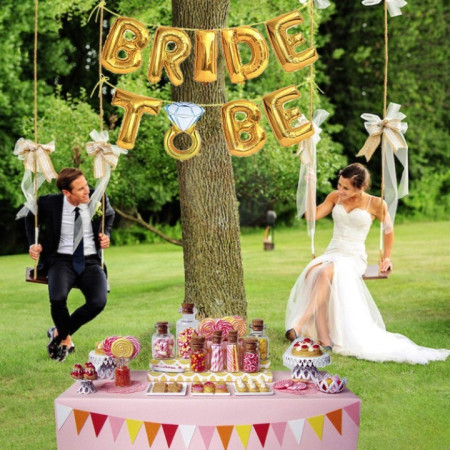 Set Baloane din Folie Metalizata, Cyrax, Model Bride to Be cu Inel de Logodna, Litere de 40 cm, Baloane Party, Ambalaj Individual, Pai Inclus, Umflare cu Aer sau Heliu, Auriu