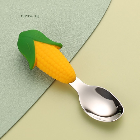 Set diversificare bebelusi Cyrax, din silicon, 23.5 x 12.5 cm, 1 farfurie compartimentata in forma de porumb, lingurita si furculita, pai, perie pai, fara alergeni, ventuza fixare,  forma creativa,  galben