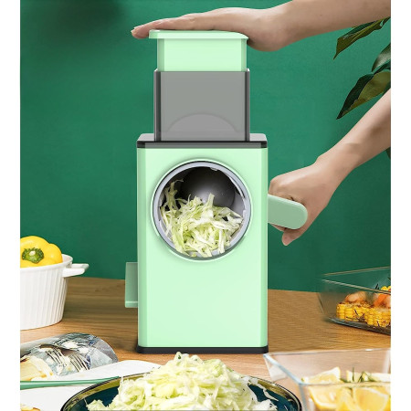 Feliator manual pentru legume Cyrax, 3 lame din otel inxodabil, 3 tipuri de feliere, material carcasa ABS, latime maxima feliere 4 mm, baza de tip ventuza, usor si sigur de utilizat, 28.5 x 9,2 x 13.5 cm, verde