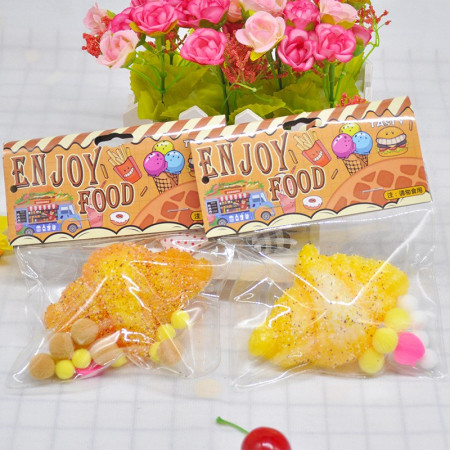 Jucarie Antistres Squishy, Cyrax, cu Revenire Lenta, Squeeze Pinch Family, Model Croissant, 10x8 cm, 90g, Ambalaj Transparent, Maro