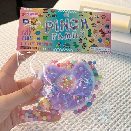 Jucarie Antistres Squishy, Cyrax, cu Revenire Lenta, Squeeze Pinch Family, Model Gogoasa, 6x6 cm, 99g, Ambalaj Transparent, Mov