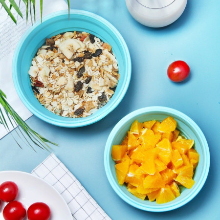 Set 2 caserole rotunde pliabile Cyrax, din silicon, rezistenta la temperaturi ridicate, usor de depozitat si curatat, 500 si 800 ml, utilizare in cuptorul cu microunde, albastra