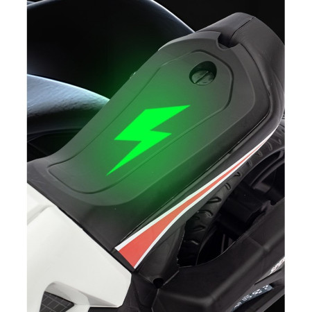 Motocicleta Electrica cu 2 Roti Mari si 2 Roti Ajutatoare, Cyrax, Acumulator Incarcare, Anti-Rasturnare, Lumini, Muzica, Motor:380, Baterie 6V4.5, 41.5x70x34 cm, 4.5 Kg, 3 Ani+, Alb Negru