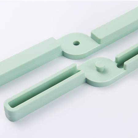 Suport pliabil din silicon pentru vase fierbinti Cyrax, portabil, usor de depozitat, rezistent la temperaturi foarte ridicate, 14.5 x 7.5 x 1.6 cm, antialunecare, verde